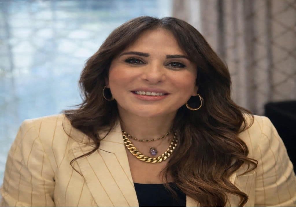 شعار وزارة الإسكان والمرافق والمجتمعات العمرانية المصرية، وبجانبه شعار بنك التعمير والإسكان، يرمزان لإجراءات رد مبالغ الحجز السكني.